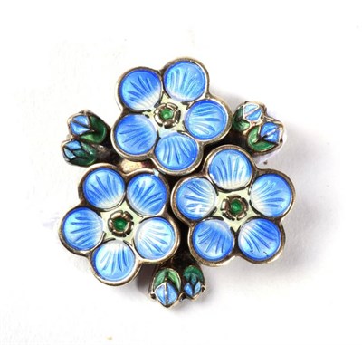 Lot 300 - A Norwegian enamel brooch by David Anderson, as a cluster of forget-me-nots, measures 3cm in...