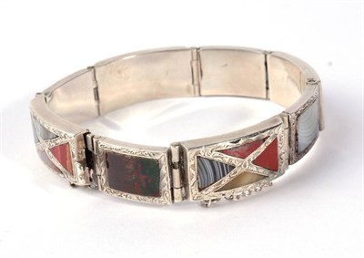 Lot 303 - A Scottish hardstone bracelet, of long and short rectangular links inset with various...