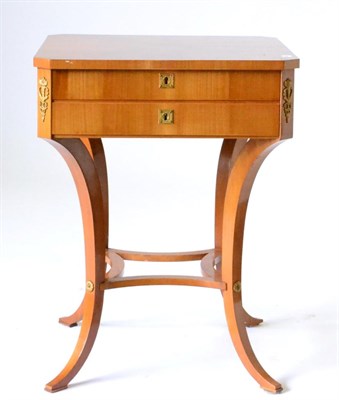 Lot 935 - A 19th Century Continental and Gilt Metal Mounted Two-Drawer Sewing Table, the quarter-veneered top