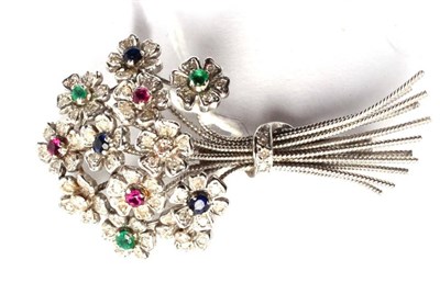 Lot 314 - A diamond, ruby, sapphire and emerald bouquet brooch, of gem-set flower heads tied by a diamond set