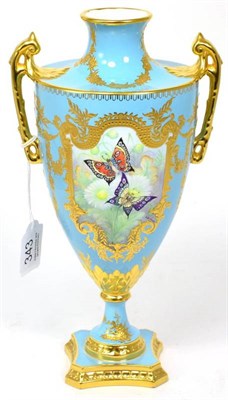 Lot 343 - Stephen Nowacki for Lynton Porcelain a blue and gilt urn painted with a vignette of butterflies