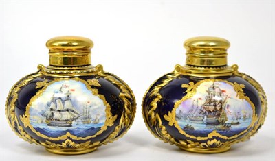 Lot 344 - Stephen Nowacki for Lynton Porcelain: a pair of silver gilt mounted porcelain scent bottles...