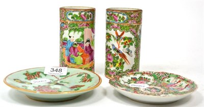 Lot 348 - A pair of Canton famille rose vases; a similar saucer and a celadon saucer (4)