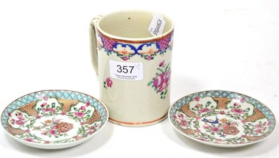 Lot 357 - An 18th century Chinese porcelain mug and a pair of Chinese porcelain saucers circa 1730