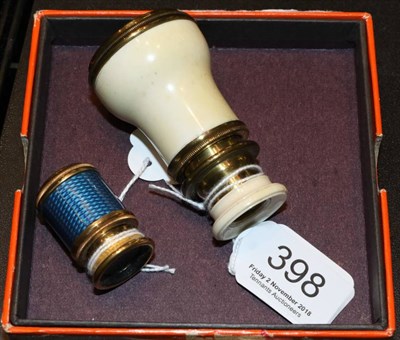 Lot 398 - A late 19th century ivory monocular; with a guilloche enamel example (2)