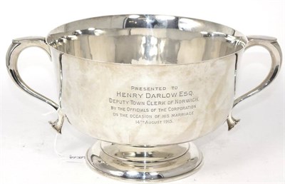 Lot 405 - A large silver twin handled bowl, William Hutton & Sons, Birmingham 1911, with scroll handles...