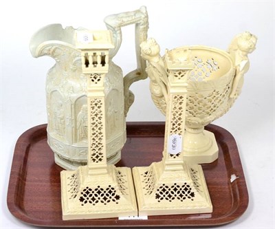 Lot 411 - A Leeds Creamware urn, early 20th century, twin caryatid handles, no cover; together with a pair of