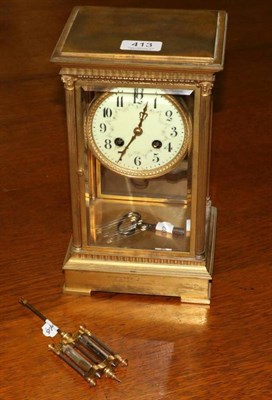 Lot 413 - A brass four glass mantel clock with twin tube mercury pendulum