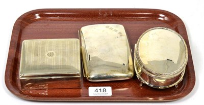 Lot 418 - An oval silver dressing table/jewellery box, Charles Edwards, London 1914; a silver cigar case...