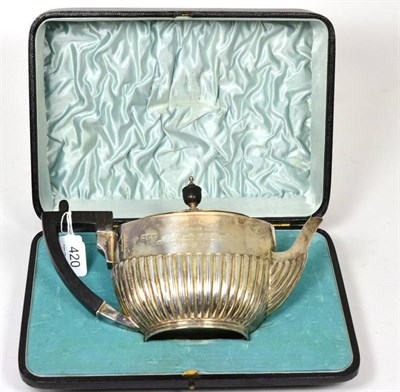 Lot 420 - A late Victorian silver teapot, Edward Hutton, London 1893, oval part fluted an with...