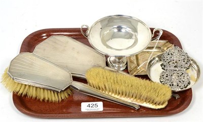 Lot 425 - Art Deco silver dressing table items; a twin handled comport; ash trays; and a buckle