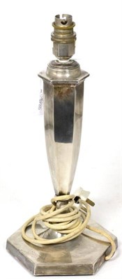 Lot 430 - An Edwardian silver lamp base, by HE, Sheffield, 1909, faceted form on hexagonal base, 37cm height