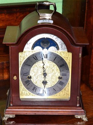 Lot 454 - A chiming mantel clock with moonphase display, movement signed Franz Hermle, made in Germany