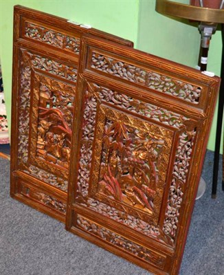 Lot 470 - Two Chinese lacquered wooden pierced panels