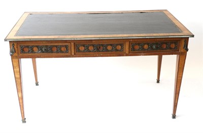 Lot 995 - A French Tulipwood and Gilt Metal Mounted Bureau Plat, in Louis XVI style, the rectangular top with