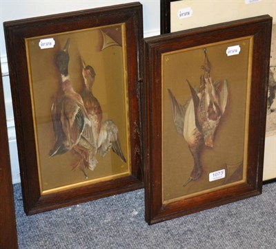 Lot 1073 - A pair of oils on panels depicting game, monogrammed