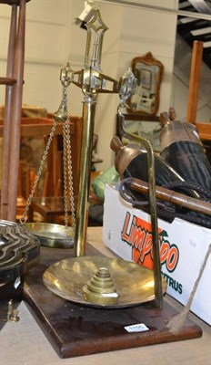 Lot 1105 - A pair of brass scales, wooden base with inset ivory plaque with makers name Bartlett & Son...