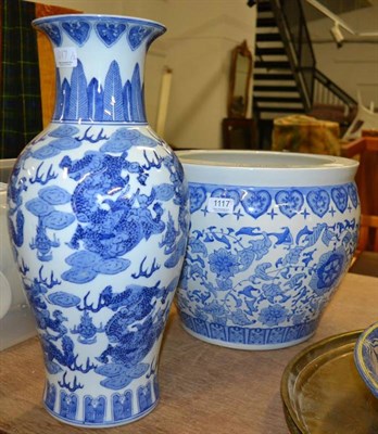 Lot 1117 - A Chinese porcelain blue and white baluster vase, together with a similar jardiniere (20th century)
