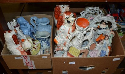 Lot 1132 - Two boxes of Staffordshire flat back figures and seated spaniels