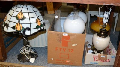 Lot 1141 - Five oil lamps converted to electricity, three further oil lamps and a table lamp with a...