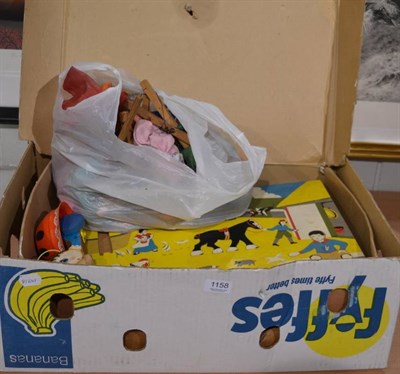 Lot 1158 - A box of assorted children's toys and games