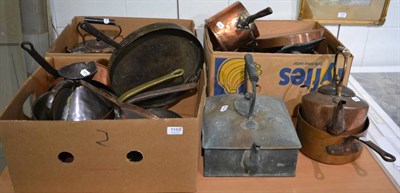Lot 1159 - A quantity of copper and brass ware comprising three copper kettles, brass pans etc