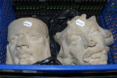 Lot 1203 - Two composition stone heads