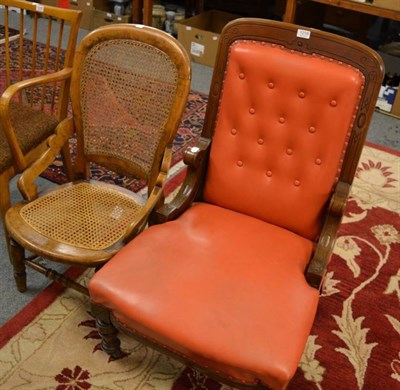 Lot 1219 - An Edwardian mahogany chair with leatherette upholstery together with a cane seated chair (2)