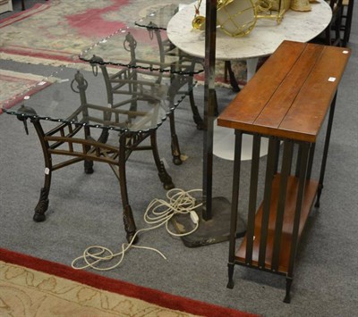 Lot 1226 - A set of three Bronzed Effect Metal and Glass Top Lamp Tables, Modern, with splayed legs and...