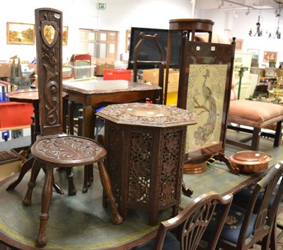 Lot 1231 - A Welsh carved oak spinning chair; an early 20th century nest of three tables and an Indian heavily