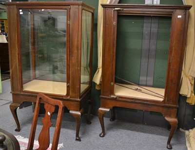 Lot 1233 - An early 20th century shop display cabinet on stand, with glazed panels and hinged door, on a stand