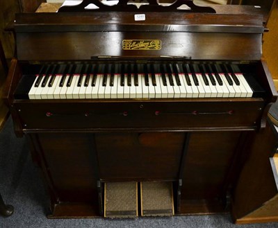 Lot 1249 - A harmonium