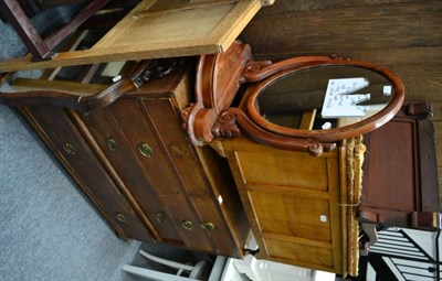 Lot 1263 - An oak four height chest of drawers, two Victorian mahogany toilet mirrors, a dressing table...