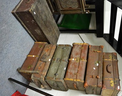 Lot 1271 - A wooden trunk together with six travelling trunks (7)