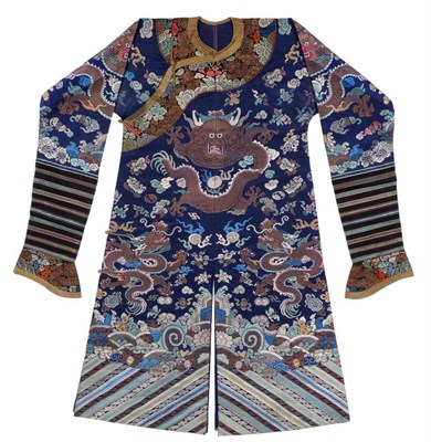 Lot 168 - A Chinese Silk Court Robe, woven with dragons, precious objects and flower sprigs above waves, on a