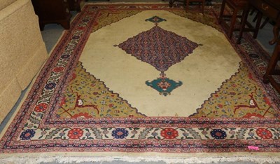 Lot 1283 - Tabriz Carpet, Iranian Azerbaijan, the plain ivory field centred by a cusped pole medallion...