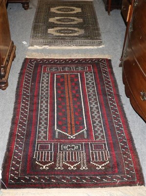 Lot 1288 - Balouch prayer rug West Afghanistan, the ''Tree of  Life'' field beneath a stepped Mihrab...