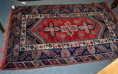 Lot 1290 - Dosemalti rug, West Anatolia,the blood red field with three stellar medallions enclosed by...