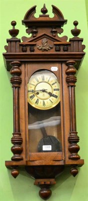 Lot 1309 - An oak veneered Vienna type wall clock