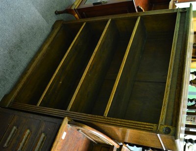 Lot 1315 - An Edwardian oak four height open bookcase