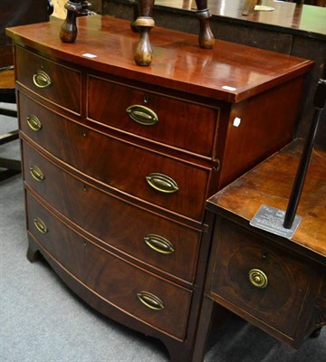 Lot 1327 - A bow fronted four height chest of drawers