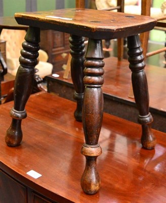 Lot 1328 - An early 19th century elm stool