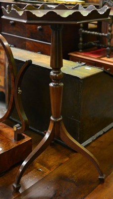 Lot 1331 - A mahogany wine table