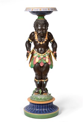 Lot 190 - A Minton Majolica Jardini&egrave;re Stand, circa 1870 , modelled as a boy representing Africa...