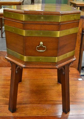 Lot 1338 - A reproduction George III brass bound mahogany wine cooler