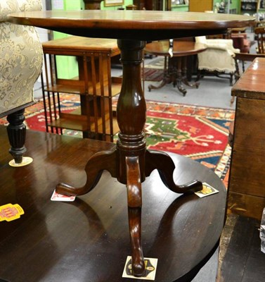 Lot 1342 - A George III mahogany tilt top tripod table