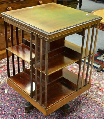 Lot 1348 - An reproduction revolving bookcase