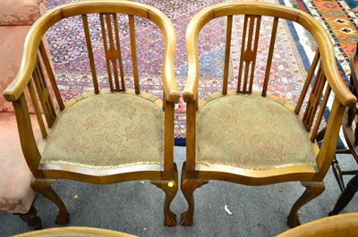 Lot 1352 - A pair of mahogany tub chairs on claw and ball feet