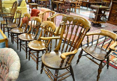 Lot 1353 - Eight chairs comprising two Windsor spindle back armchairs; a set of four spindle back dining...