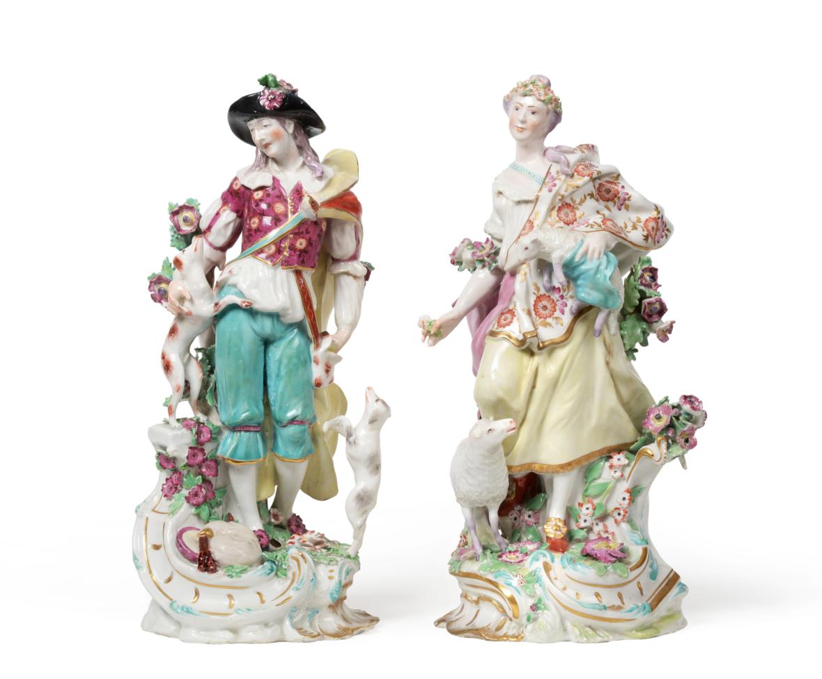 Lot 206 - A Pair of Chelsea Porcelain Figures of a Shepherd and Shepherdess, circa 1765, he standing with two